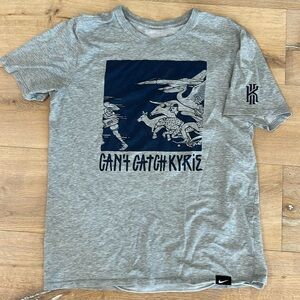 Nike men’s Kyrie dri-fit tee in medium.